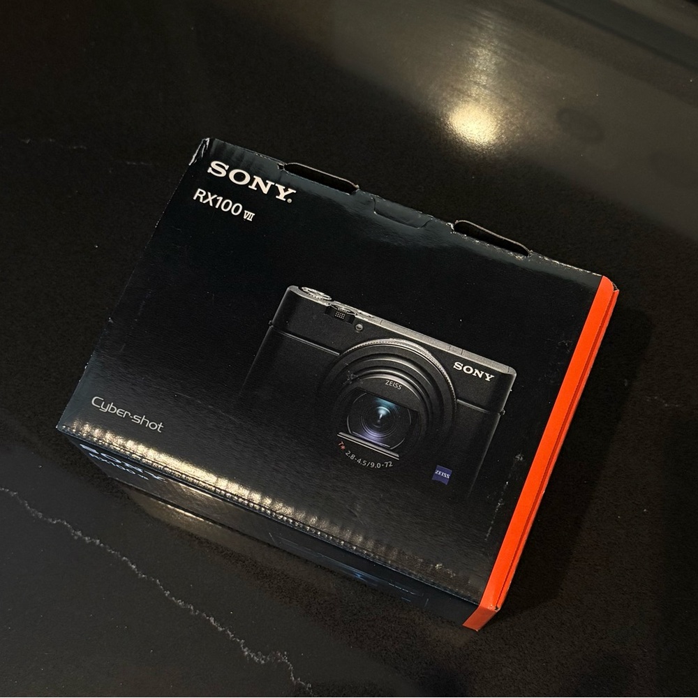 Sony Black and Orange Digital Camera Sleek Design